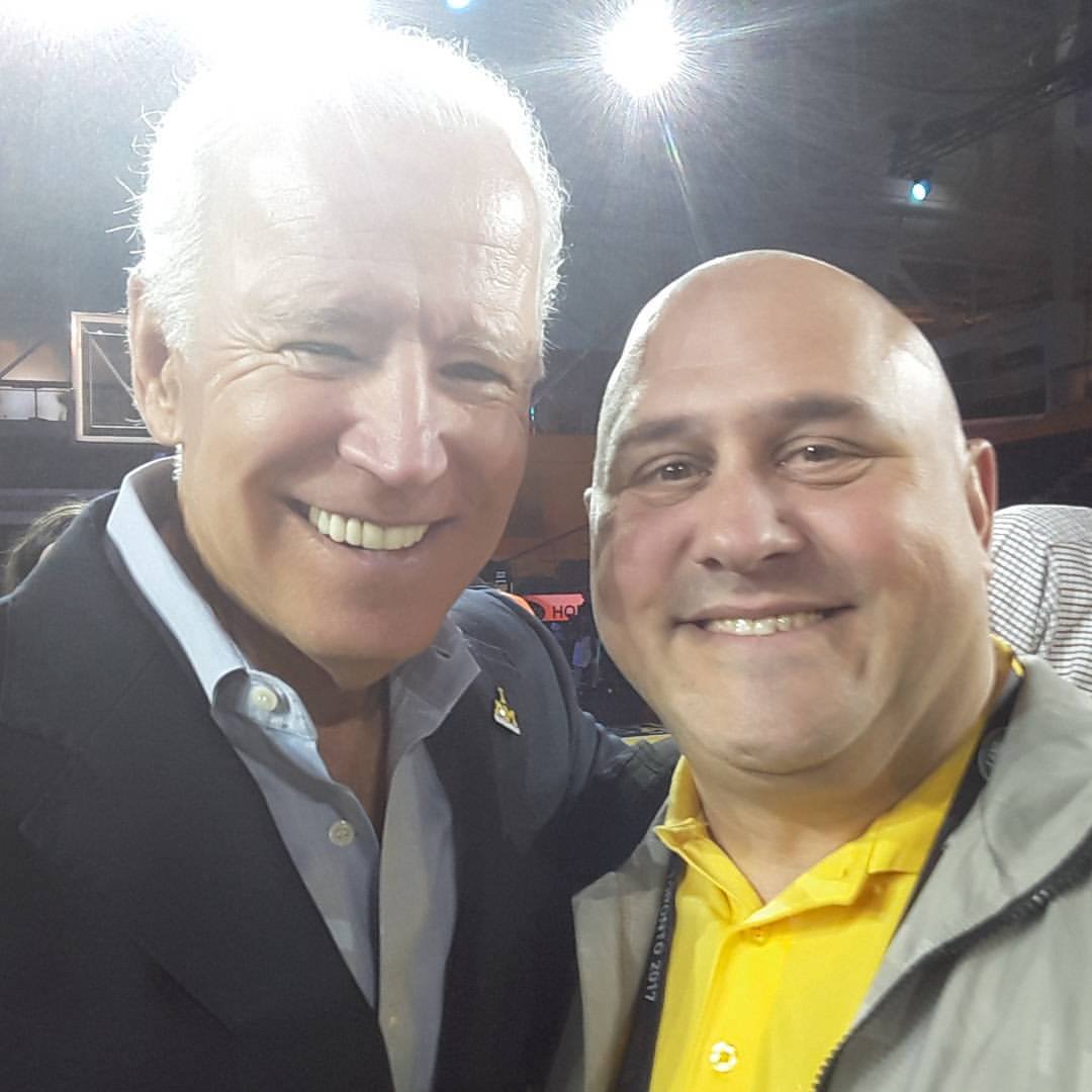 Mike Ross smiling with former Vice President of the United States, Joe Biden