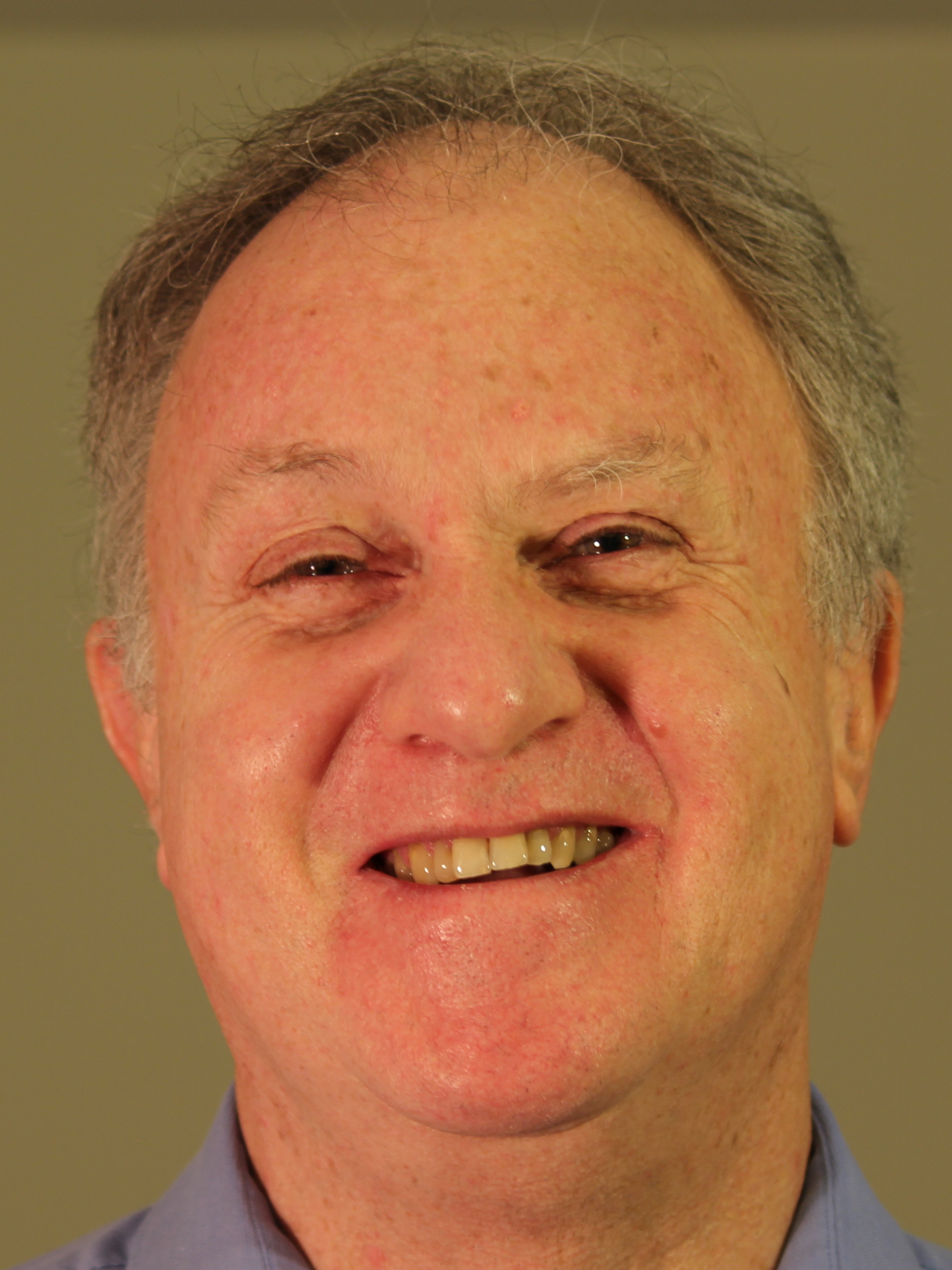 Dennis Raphael smiling
