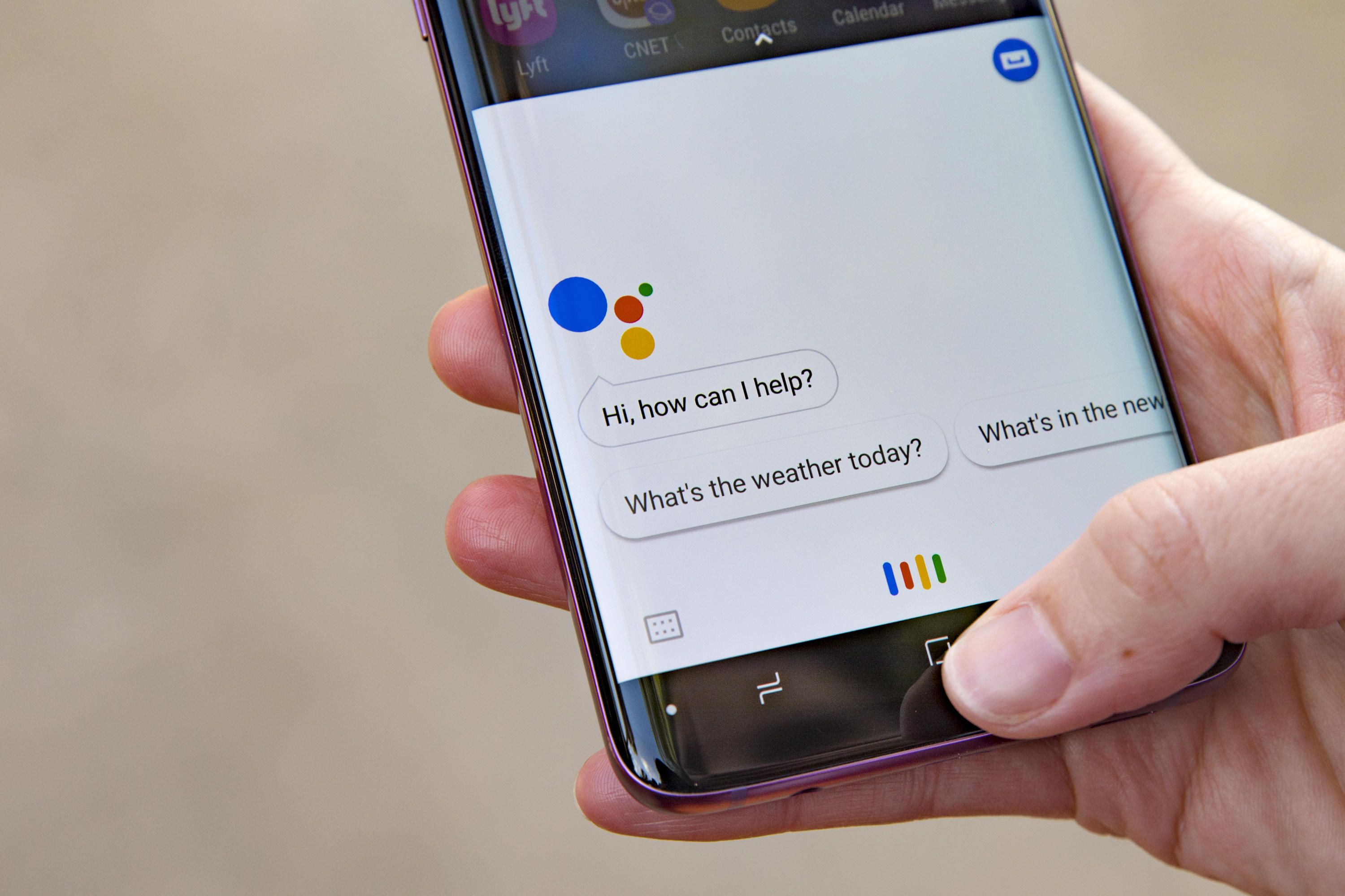 Someone using Google Assistant on their phone