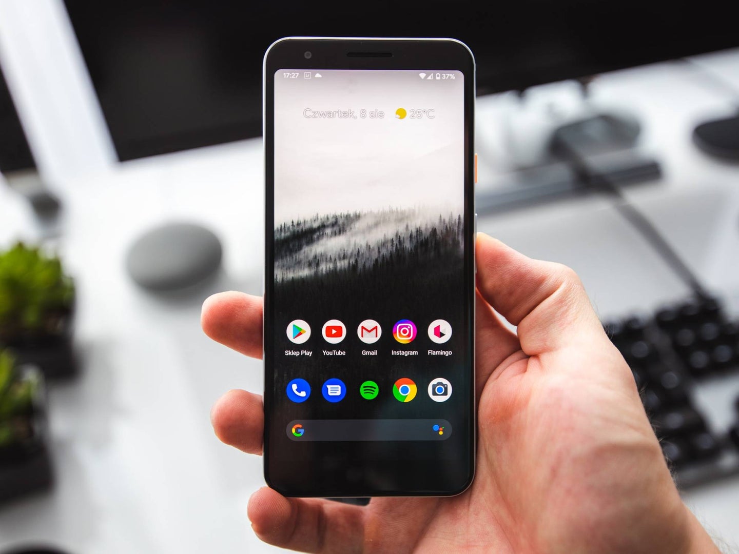 Someone holding a Google Pixel