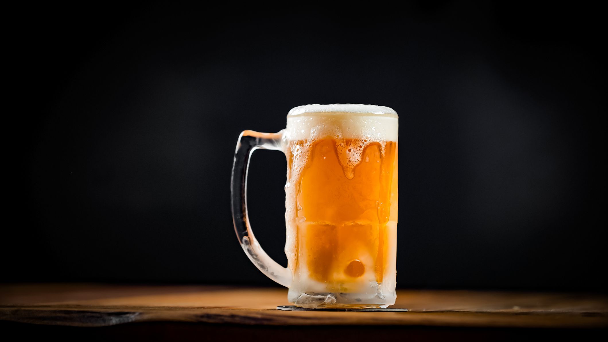 An ice cold beer in a pint glass