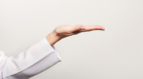 the side profile of an outstretched hand sticks out palms up
