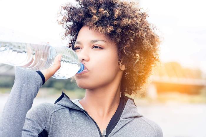 A woman drinking water