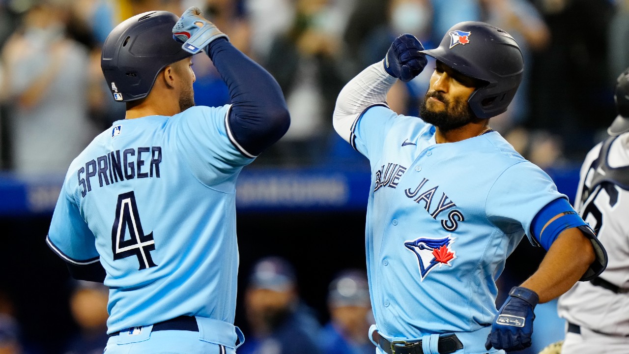 Two Toronto Blue Jays players celebrating