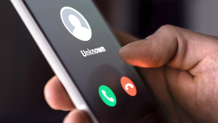 A person receiving an unknown call