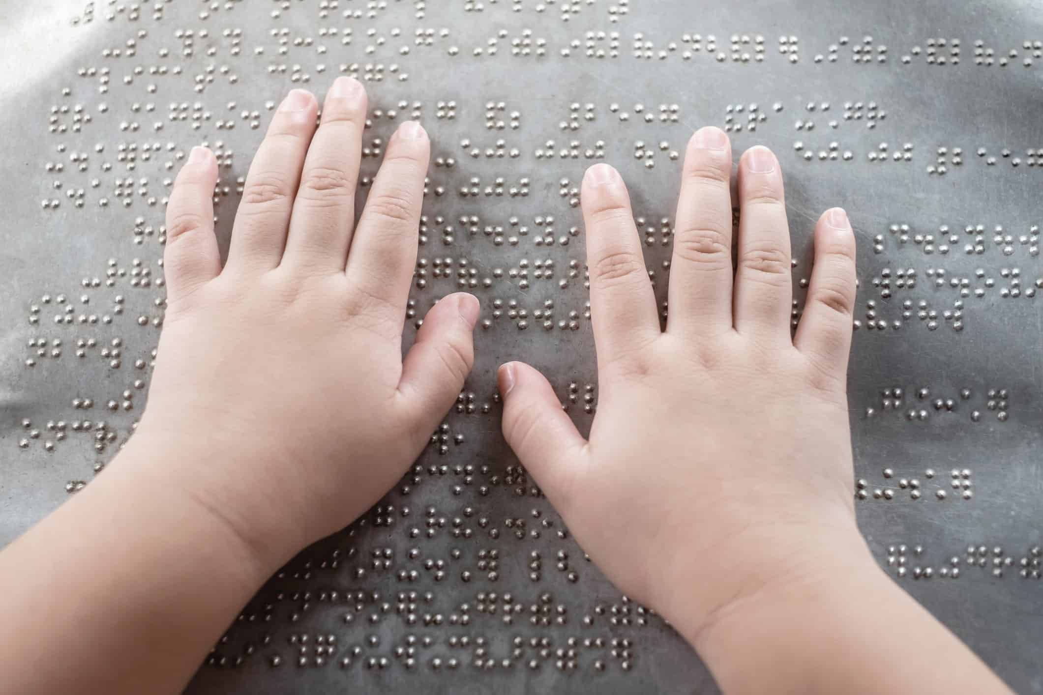A person using braille