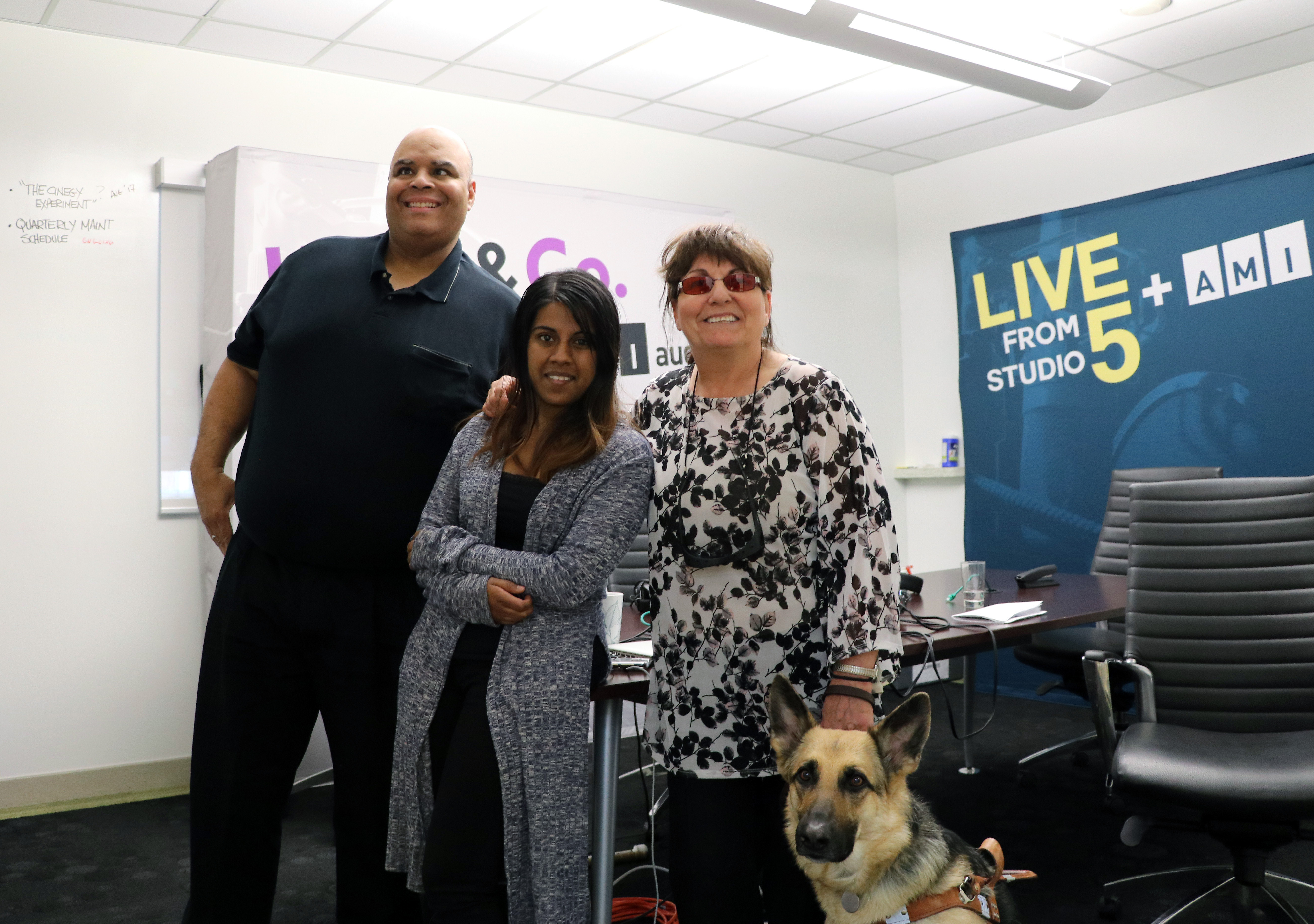 Suzanne poses with Kelly, Ramya and Emily in studio. 