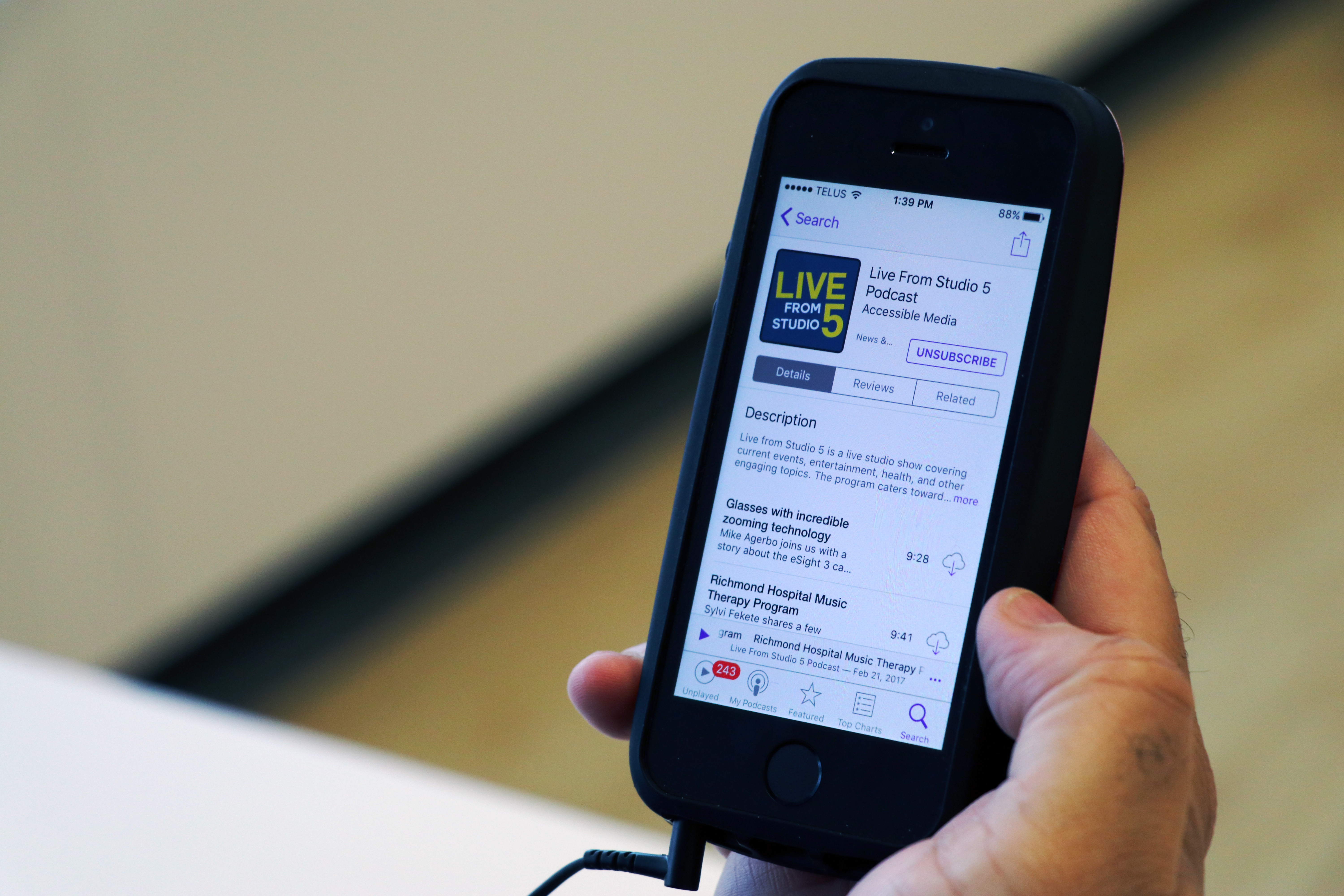 An iPhone screen displaying the Live from Studio 5 podcast.