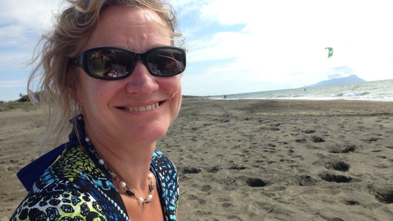 Carol Yaple smiles into the camera.