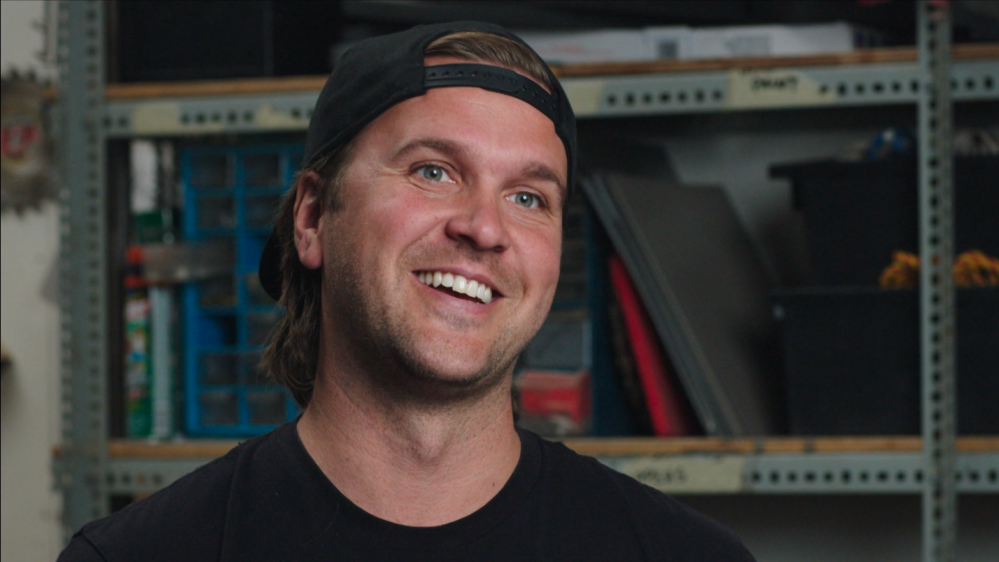 Bruce Cook smiles into the camera.