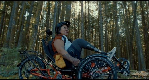 Therese Estacion sits on an adaptive bike.